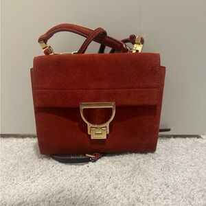 Coccinelle Arlettis suede crossbody bag